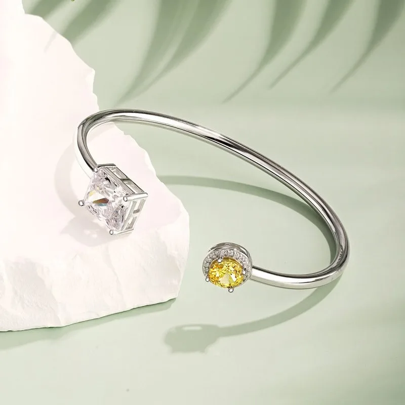 Platinum-plated S925 sterling silver bangle with zirconia, "高碳钻" and "冰花切" style