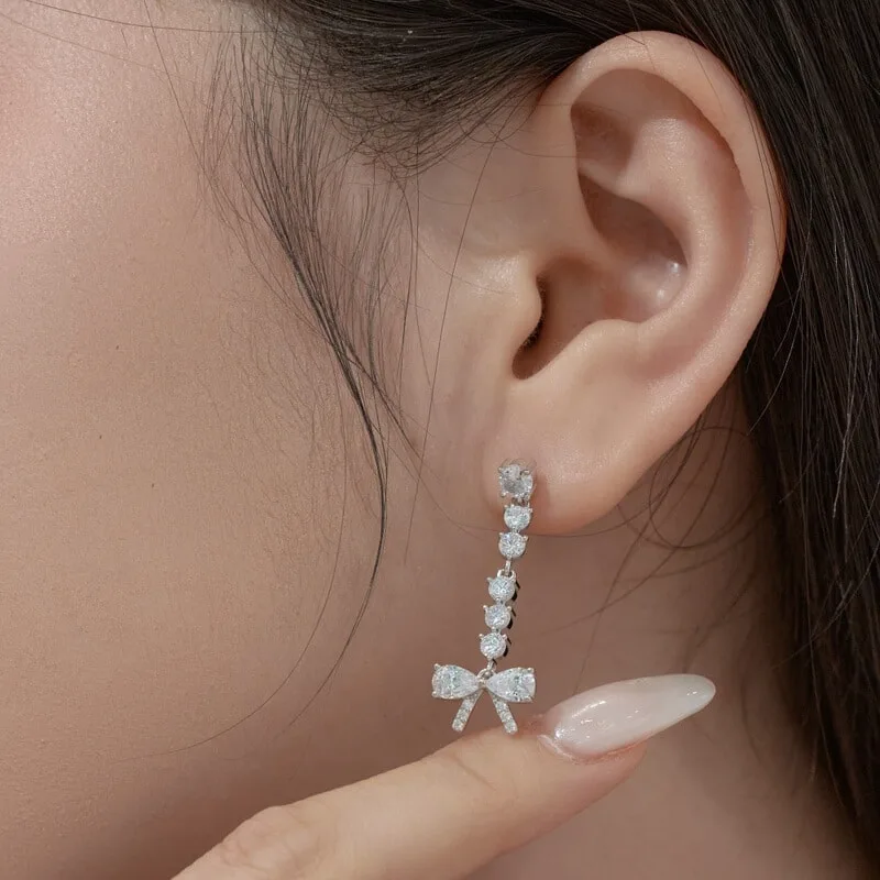 S925纯银流苏耳钉女镶嵌梨形锆石欧美精致个性蝴蝶结设计耳饰